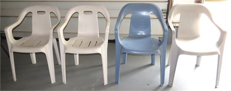 4 Plastic Stacking Chairs