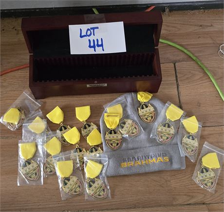 Sports metals, hat and American Eagle Silver Dollar Box