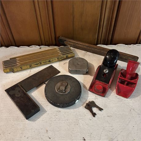 Assorted Measuring Tapes and Devices + Two Small Planes