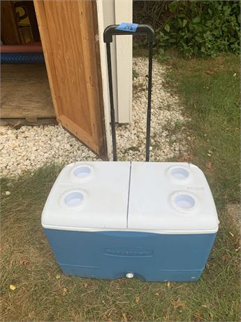 Rubbermaid Blue And White Rolling Cooler With Handle And 4 Cup Holders On Top