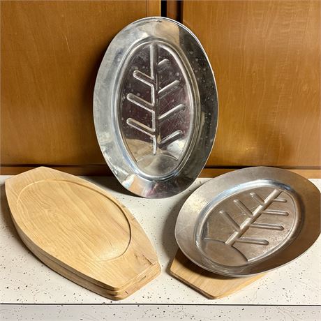 Set of 4 Oval Aluminum Plates with Teak Bases