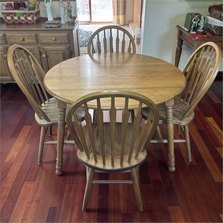 Round Drop Leaf Wood Dining Table and 4 Chairs - Table is 42" round (leaves out)