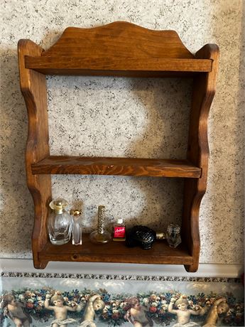 Small Wall Hanging Shelf with Perfume Bottles