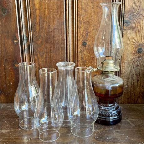 Oil Lamp and Assorted Glass Chimneys