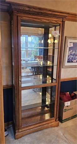 Howard Miller Lighted Dublin Curio Cabinet With Glass Shelves