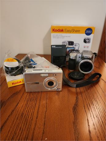 2-Easy Share Kodak Cameras w/some accessories