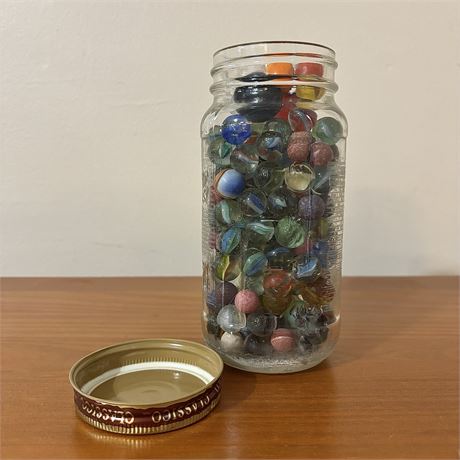 Glass Jar Filled with Old Marbles