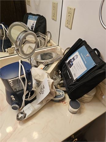 Mixed Bathroom Supplies- Water Flosser, Blood Pressure Machine & More