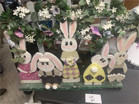 Wood Easter Bunnies In Front Of Wood Fence Decoration