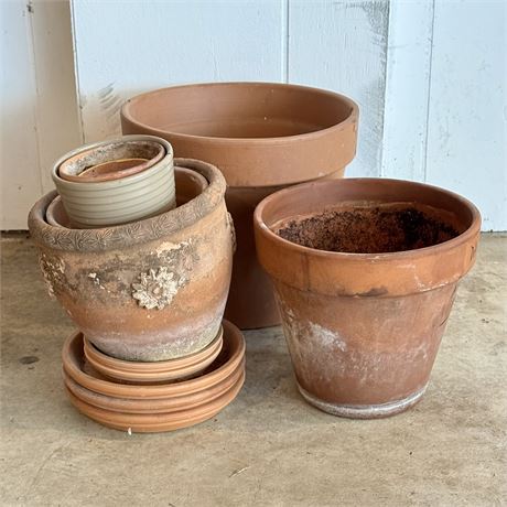 Collection of Terracotta Flower Pots and Saucers