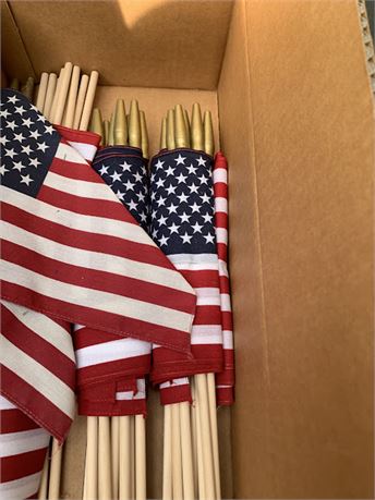 Box Of Small American Flags On Sticks With Gold Tips