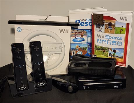 Wii w/ 2 controllers, Nunchuk, Wheel, and Games-(Black)