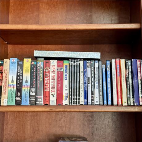 Mixed DVD and VHS Shelf Cleanout