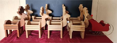 8 carved reindeer and sleigh