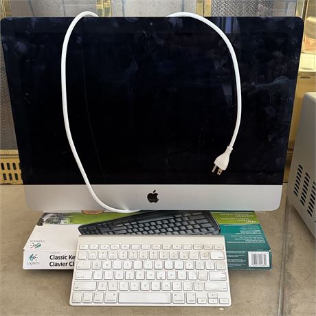 Apple 24" Monitor, Cordless Keyboard and Logitech Keyboard