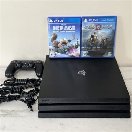 Sony Playstation 4 Console, Remote, Cords and 2 Games