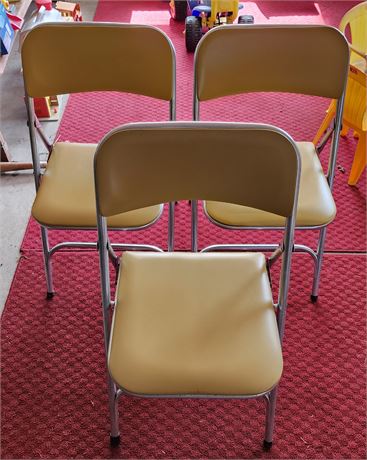 Three Folding Chairs