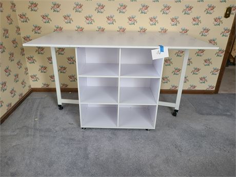 Large White Crafting Table with Fold Down Sides & Storage - On Castors