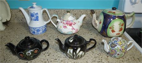 6 Teapots