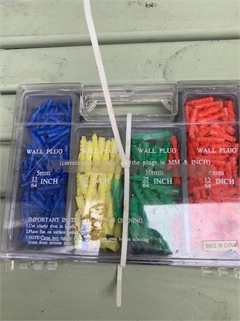 Multicolored Wall Plug Anchors In Plastic Storage Case