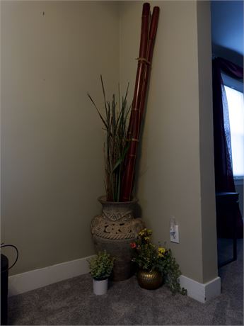 large faux bamboo plant in large planter