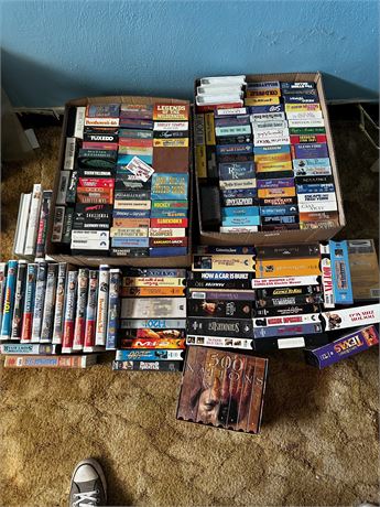 Large lot of VHS Disney movies and many others, some never opened