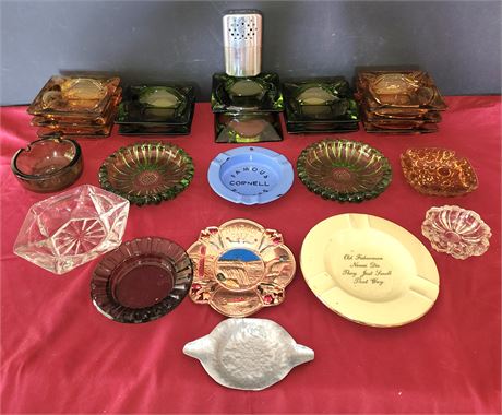 Assortment of of ash trays, mostly glass