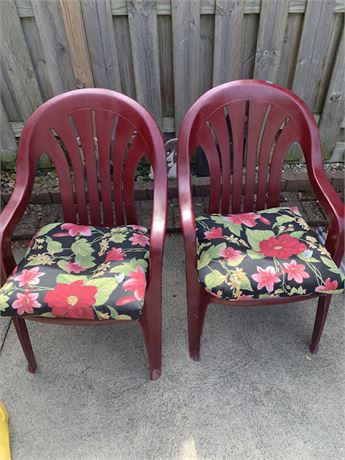 2 Maroon Colored Outdoor Plastic Patio Chairs & Floral Chair Cushions/Pads