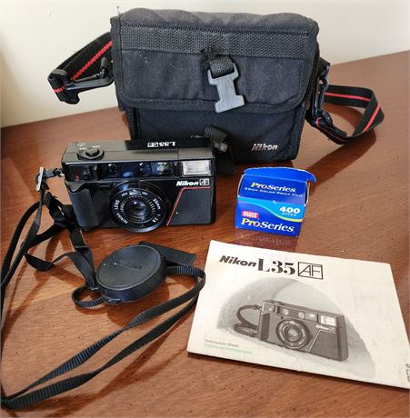 Nikon L35AF Camera/ Bag/Film/Manual