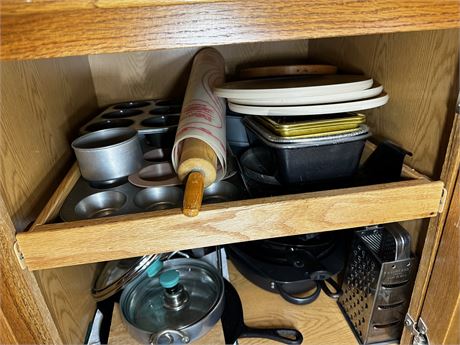 Cabinet of Bakeware items