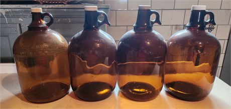 4 Brown jugs