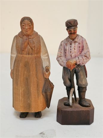 Vintage Wood Carved Swiss Made Man & Lady Figurines