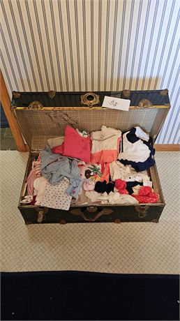 Metal Steamer Trunk Filled With Different Size Toddler Clothes