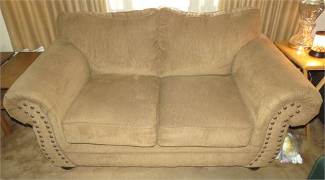 Tan Love Seat