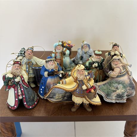 Collection of Thomas Kinkade Santa Ornaments