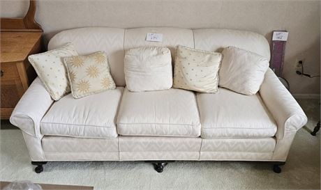 White Footed Herringbone Pattern Couch with Throw Pillows
