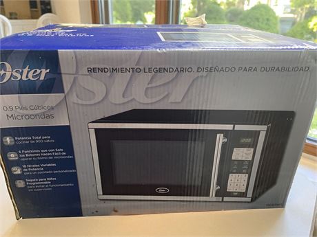 Black Oster 0.9 CU. Ft. Countertop Microwave Oven Model OGB7901 In Original Box