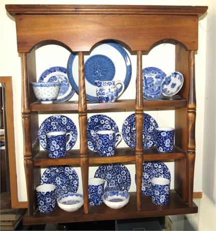 Display Shelf With Small Blue Dishes