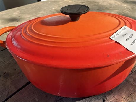 Le Creuset Enameled Cast Iron Dutch Oven In Flame Orange Color